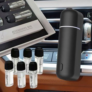 Автомобильный электронный диффузор Ultrasonic Car Aroma Diffuser Black с 6 ароматами 04k03p209v1 фото