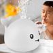 Силиконовая игрушка для купания ребёнка Spray Water Bath Toy Кит с фонтанчиком и LED подсветкой Белый 03k05p029v1 фото 1
