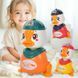 Музыкальная интерактивная игрушка Уточка Cute Duck 986A звук, свет, в ассортименте (IGR24) 03k05p491 фото 1