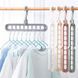 Багатофункціональна вішалка для одягу на 9 отворів Mini Wonder Hanger 9 Pieces Бірюзова (575) 01k06p036v3 фото 4